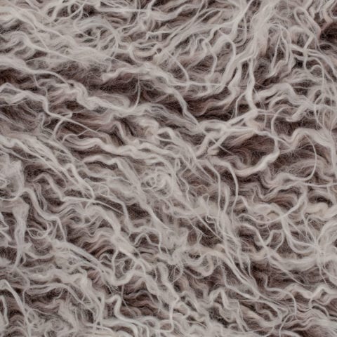 swatch of shaggy brown and white faux fur