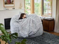 Cosy Stone Fur foam filled bean bag in living room - Grande KloudSac SafeSac