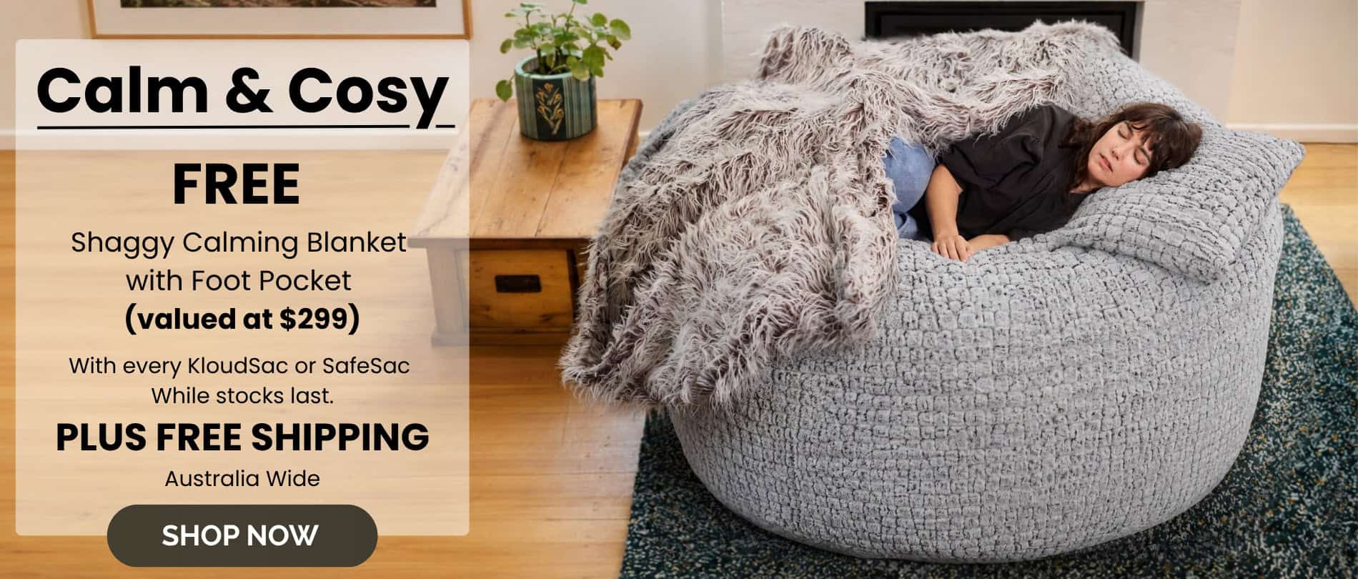 Foam filled bean bag with shaggy blanket and foot pocket in a cozy living room.